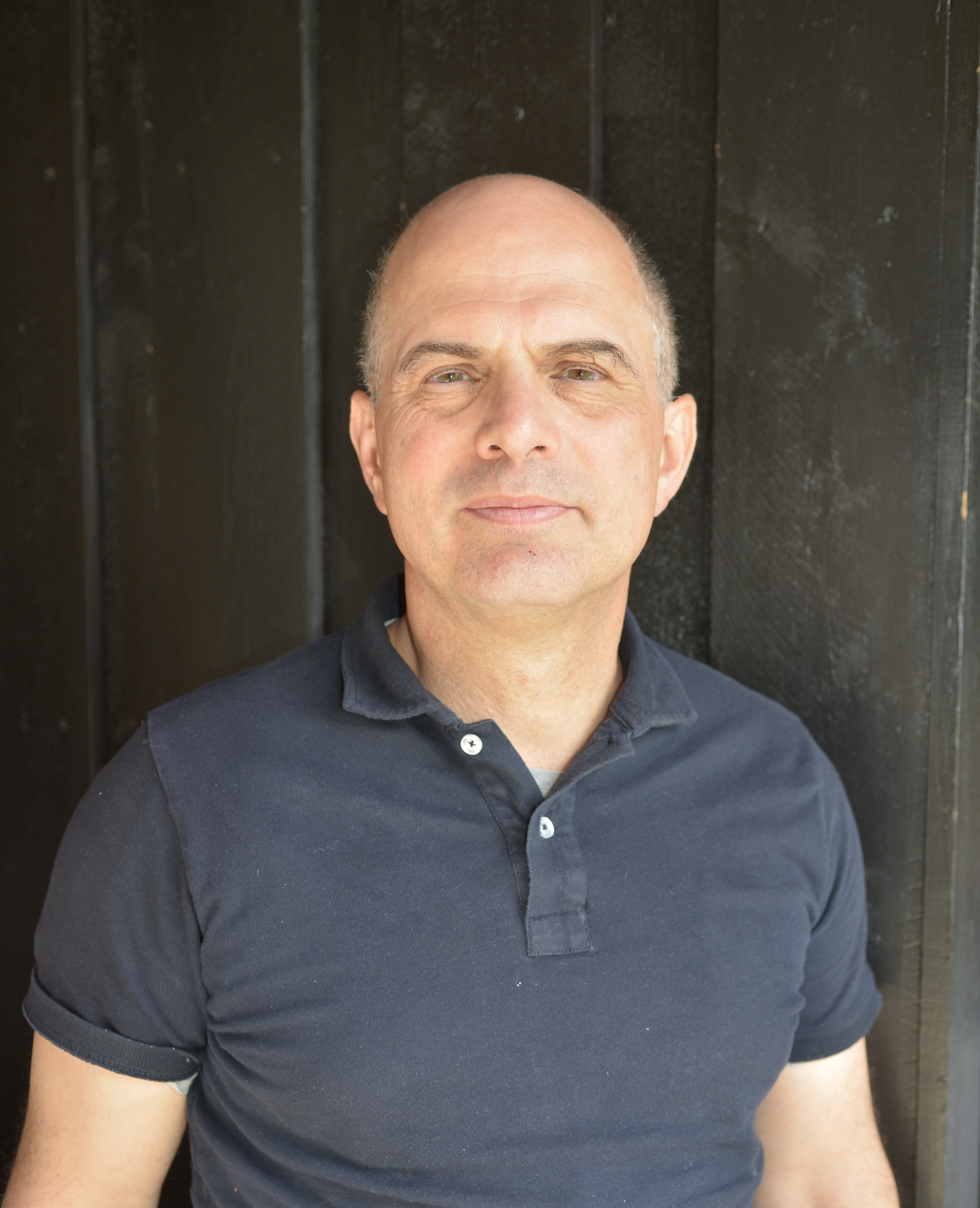 A man in a blue shirt