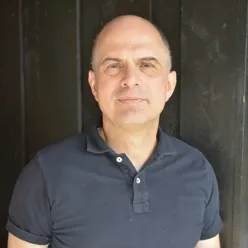 A man in a blue shirt