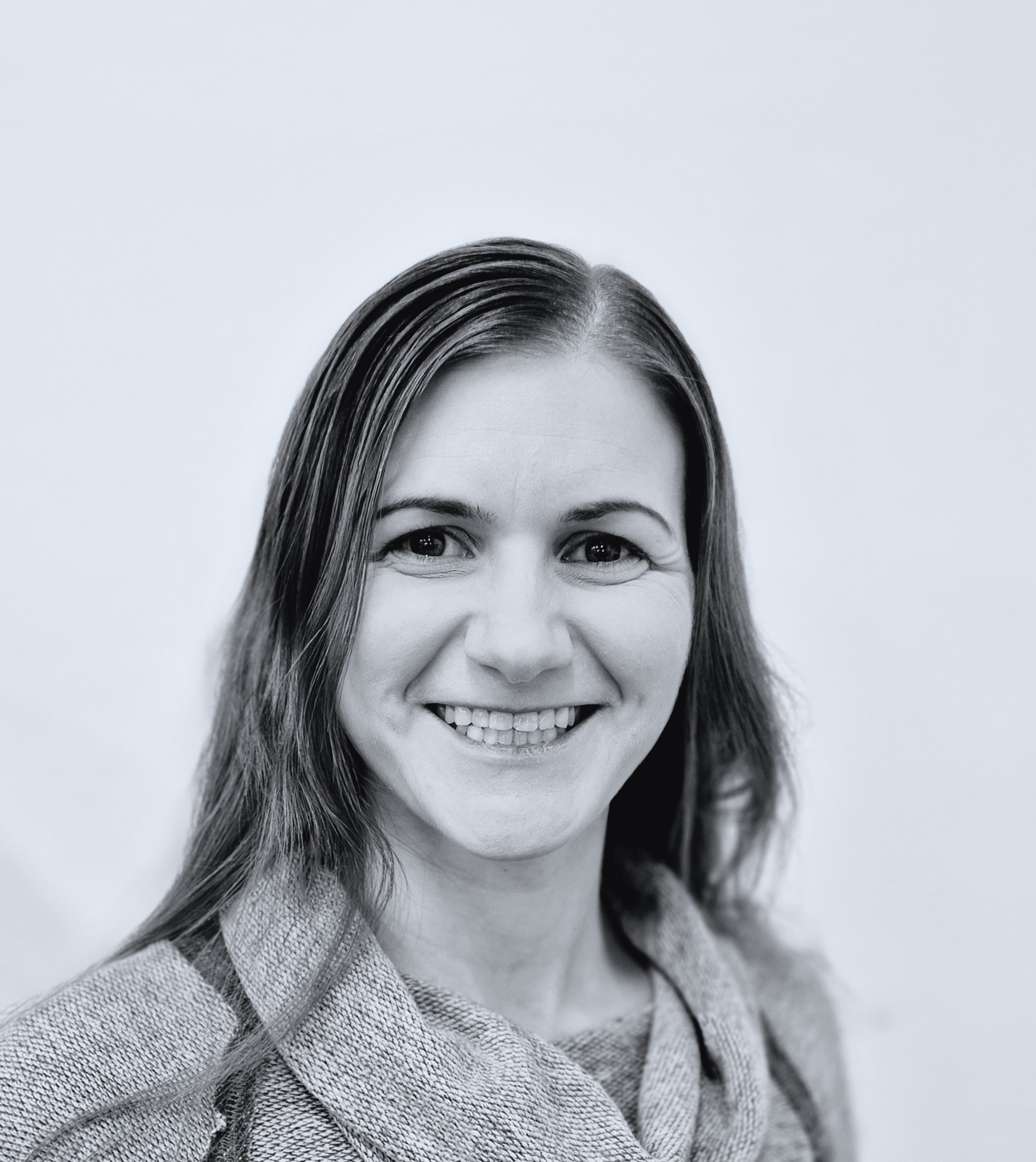 A woman smiling for the camera