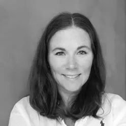 A woman smiling for the camera