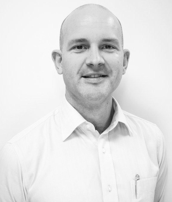 A man wearing a white shirt