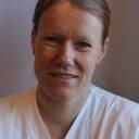 Portrettbilde av Jørghild Jensen i hvitt.