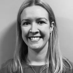 A woman smiling for the camera