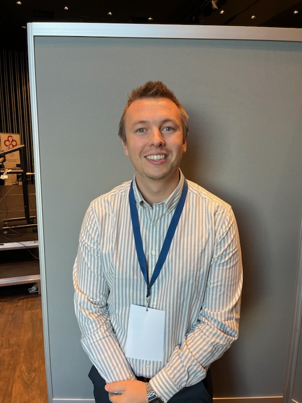 A man holding a piece of paper