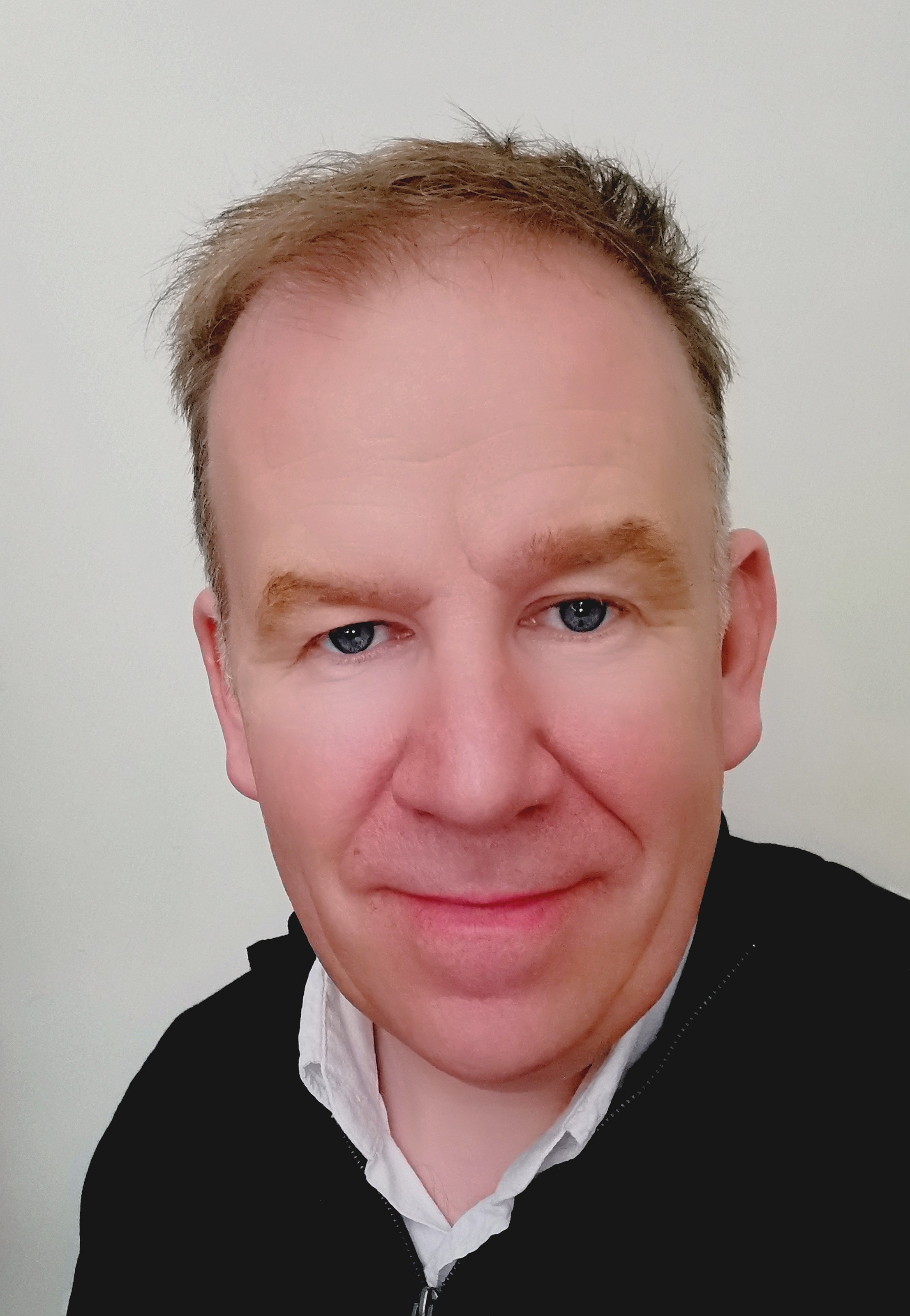 A man smiling for the camera