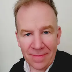 A man smiling for the camera