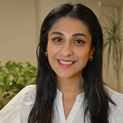 A woman smiling for the camera