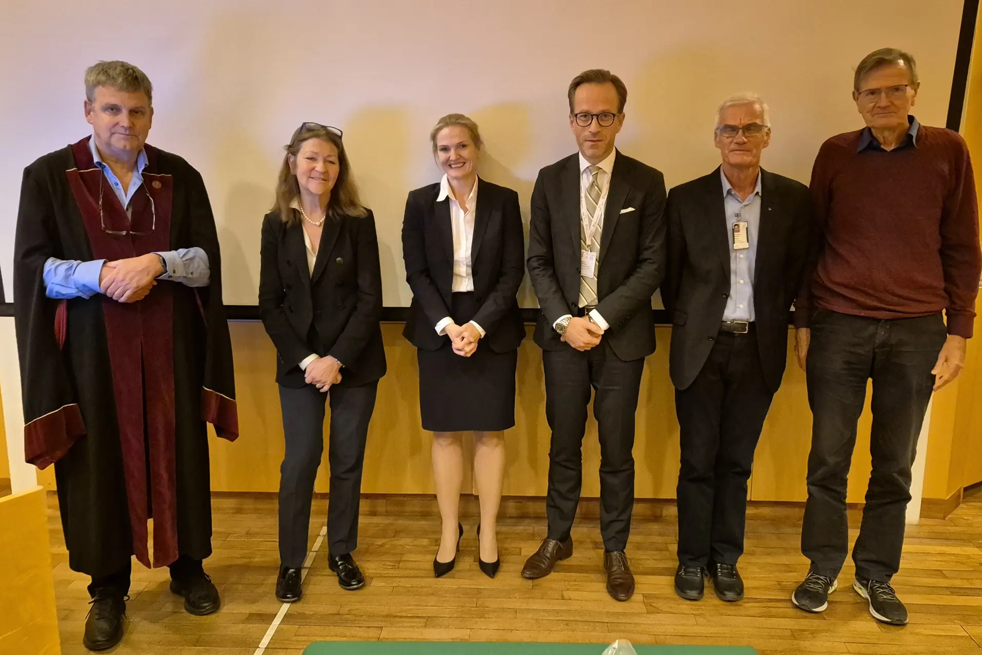 Tove posing with her supervisors and committee members.