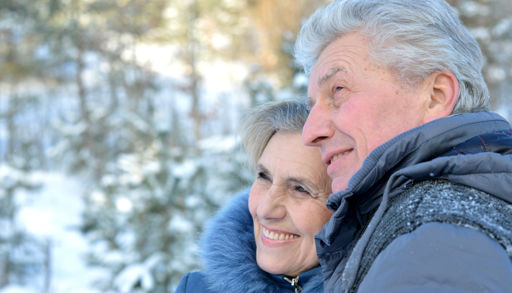 A man and woman smiling